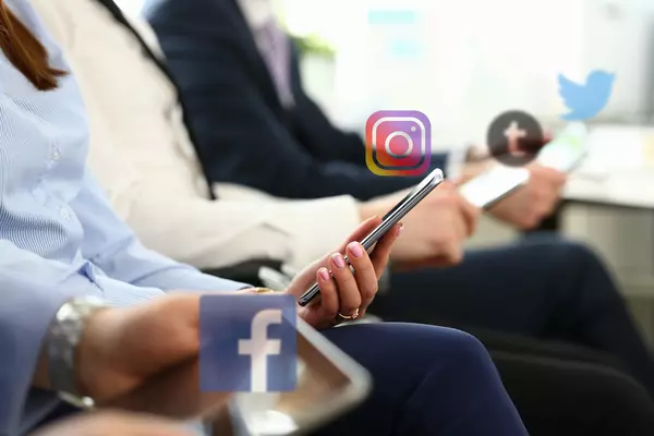 group-business-people-hold-mobile-device