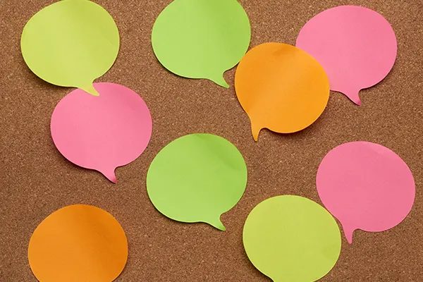 colorful-paper-stickers-glued-on-brownboard-idea-2023-11-27-04-54-27-utc-envato
